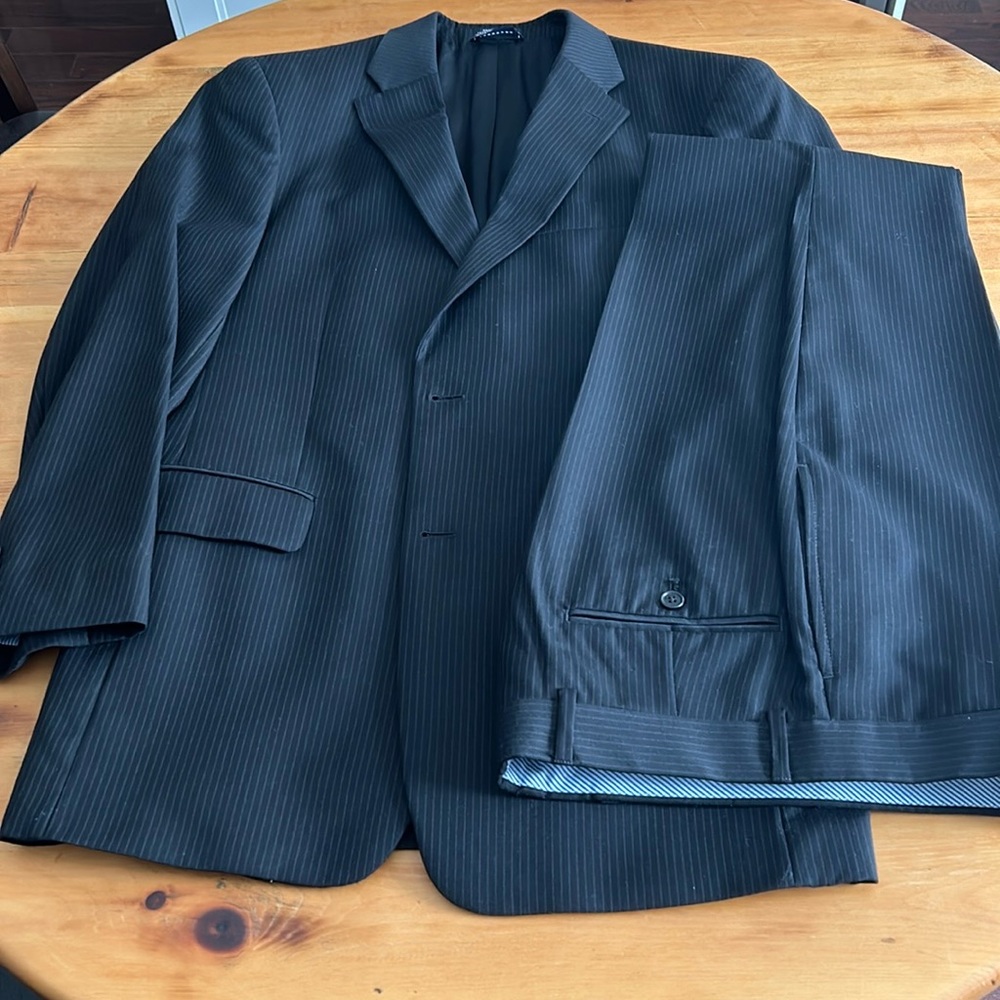 Tommy Hilfiger black pinstripe suit - coat 38R - 32 pant - very good condition.